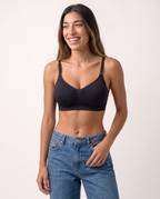 Model laughing in the Wireless Shaping Bra in black