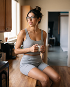 Model at a kitchen counter in the gray Ribbed Lounge top and boxer short