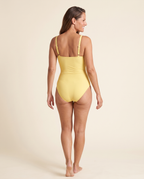 Back view of the Shaping Swimsuit with Pads in yellow