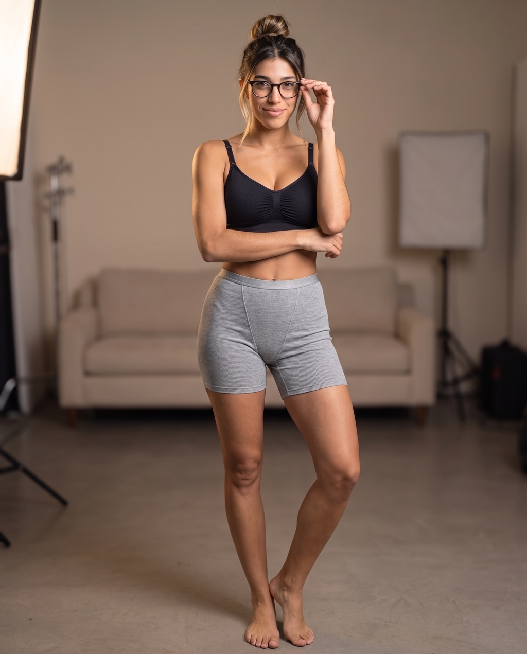 Model wearing the Ribbed Lounge Boxer Short in gray with matching bra top, front view