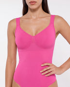 The Cooling Sculpt Bodysuit in Pink, close front view of neckline and shaping knit