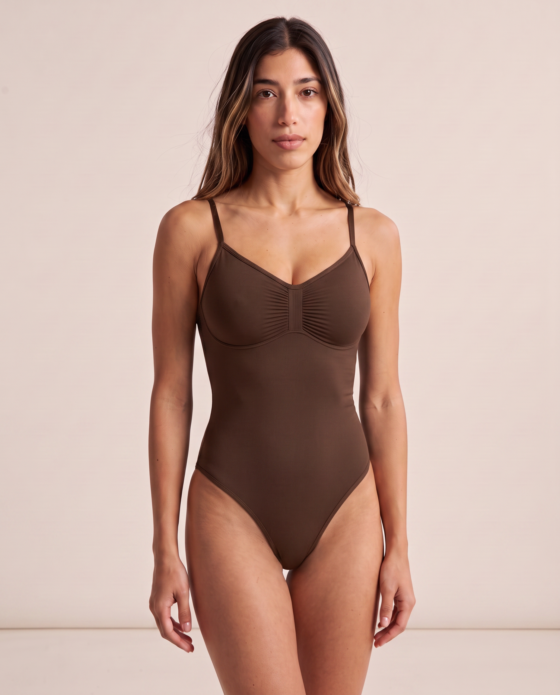 Model wearing the full coverage One & Done Shaping Bodysuit in mocha brown