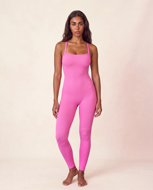 Front three-quarter view of the Bra-Free Shaping Jumpsuit in Blush Pink, shown in the matched pose used for colour comparison.