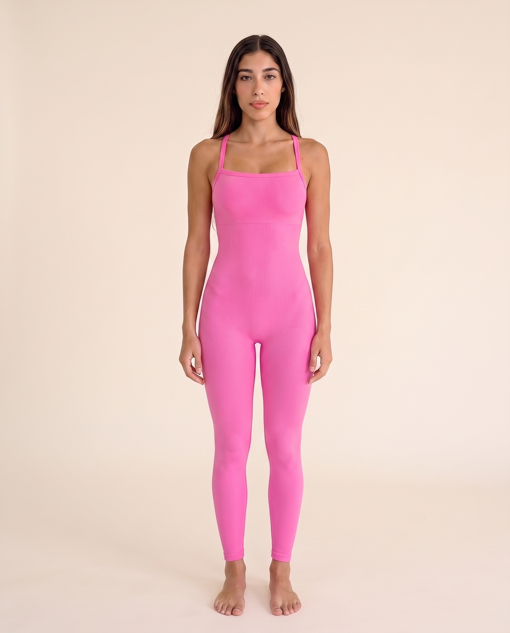 Straight-on front view of the Bra-Free Shaping Jumpsuit in Blush Pink, showing the square neckline and smooth double-layered chest.