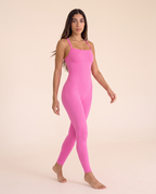 Three-quarter turning view of the Bra-Free Shaping Jumpsuit in Blush Pink.