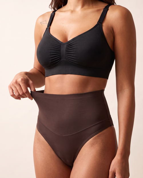 No-Show Tummy Control Thong in Deep Nude — three-quarter product close-up.
