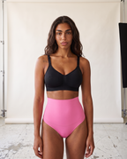 No-Show Tummy Control Thong in Blush Pink — front product view in studio.