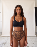 No-Show Tummy Control Thong in Leopard Print — front product view in studio.