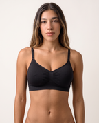 Model wearing the Wireless Shaping Bra in black, front view