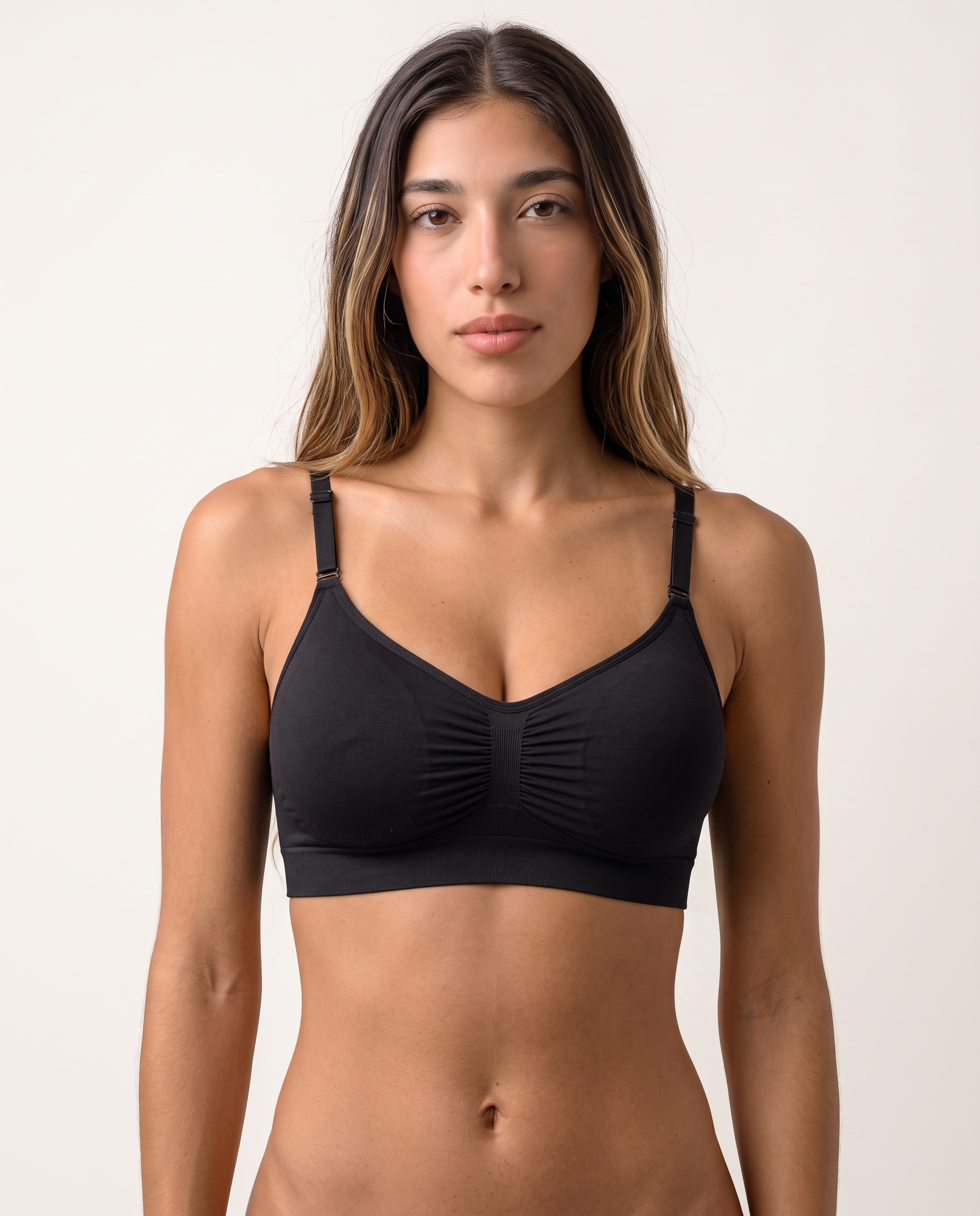 Model wearing the Everyday Wireless Bra in black, front view